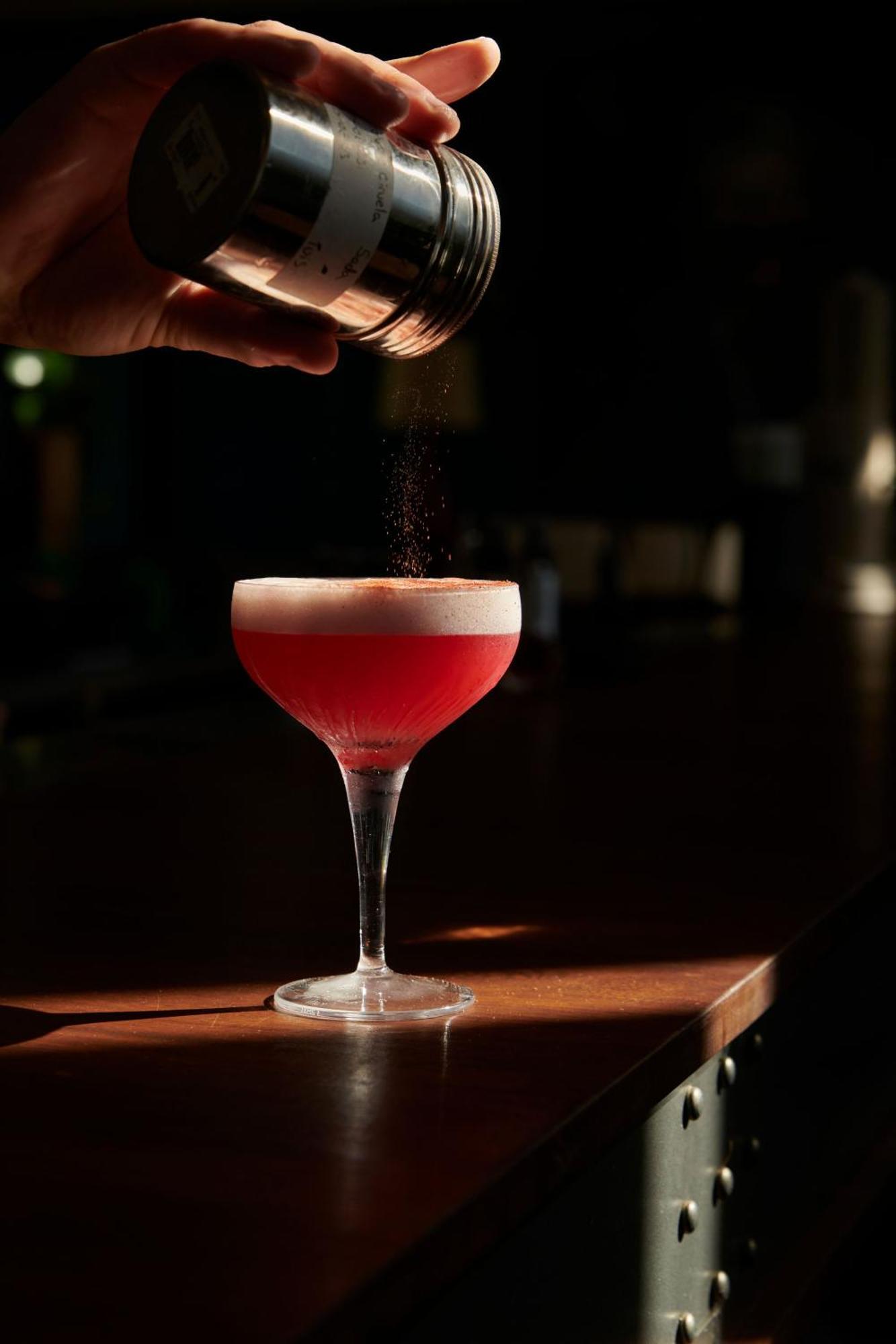 The Click Clack Hotel Medellín Exterior foto A Clover Club cocktail being garnished with ground nutmeg
